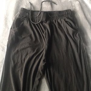 It’s black pants with white stripes.